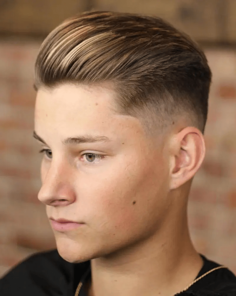 Slicked Back Hair With Medium Fade: 