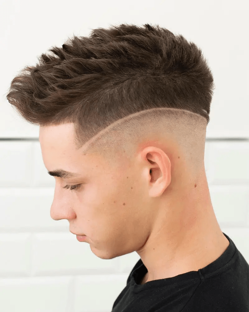 Undercut Fade With Hard Part And Textured Spikes: 